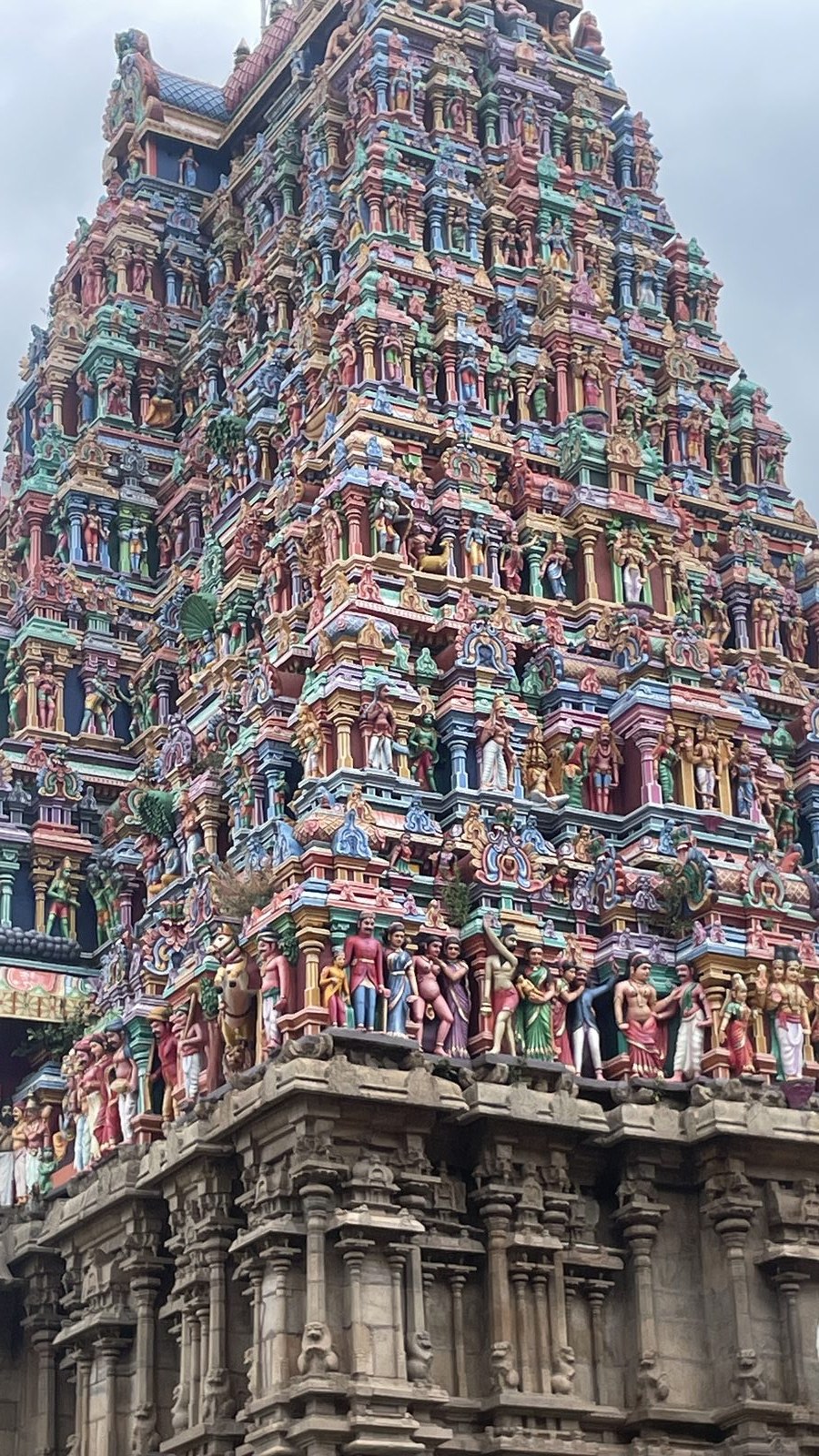 Meenakshi Amman Temple gopuram, Madurai — colourful Dravidian architecture